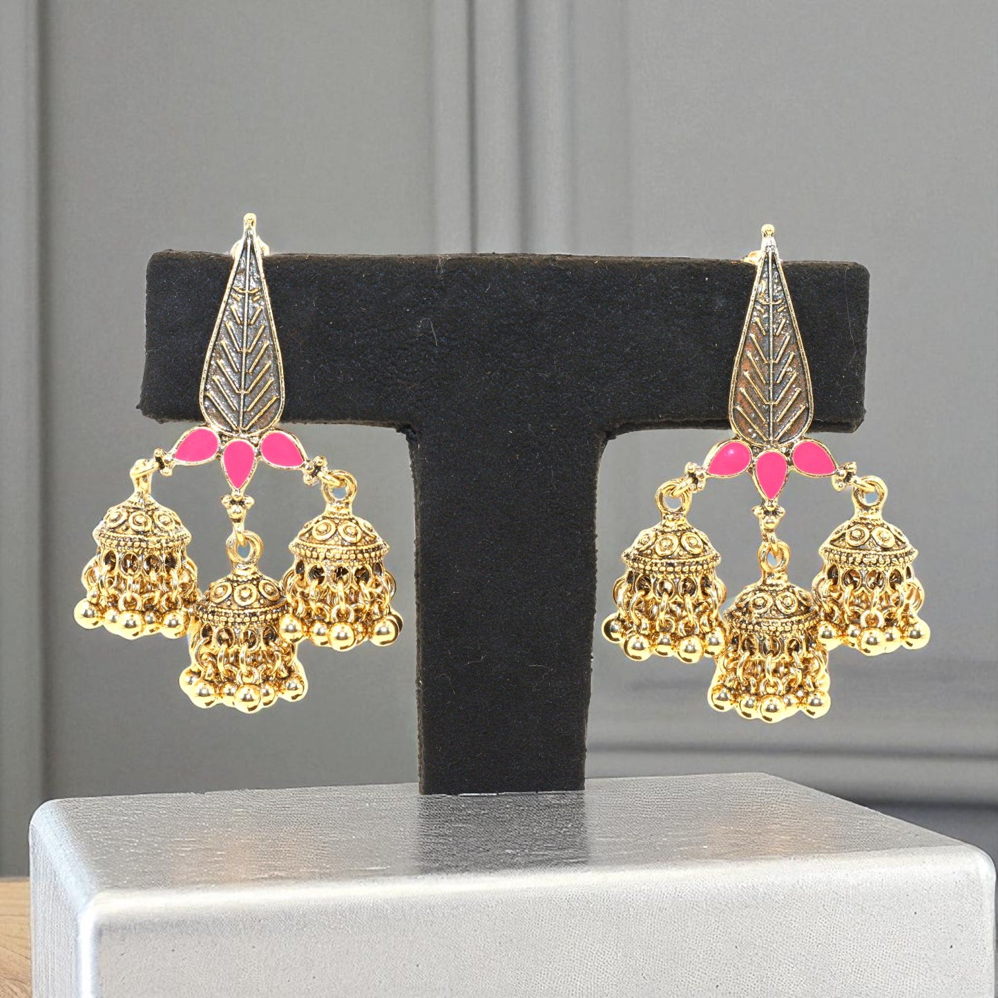 Triple Jhumka Dangler Earrings with Pink Enamel Leaf Design – Antique Gold Finish