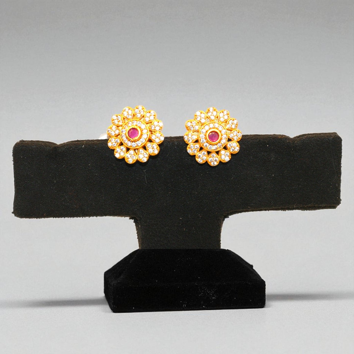 Floral CZ Stud Earrings with Ruby Center