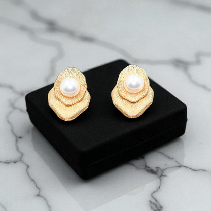 Handmade Earrings with pearl in the centre