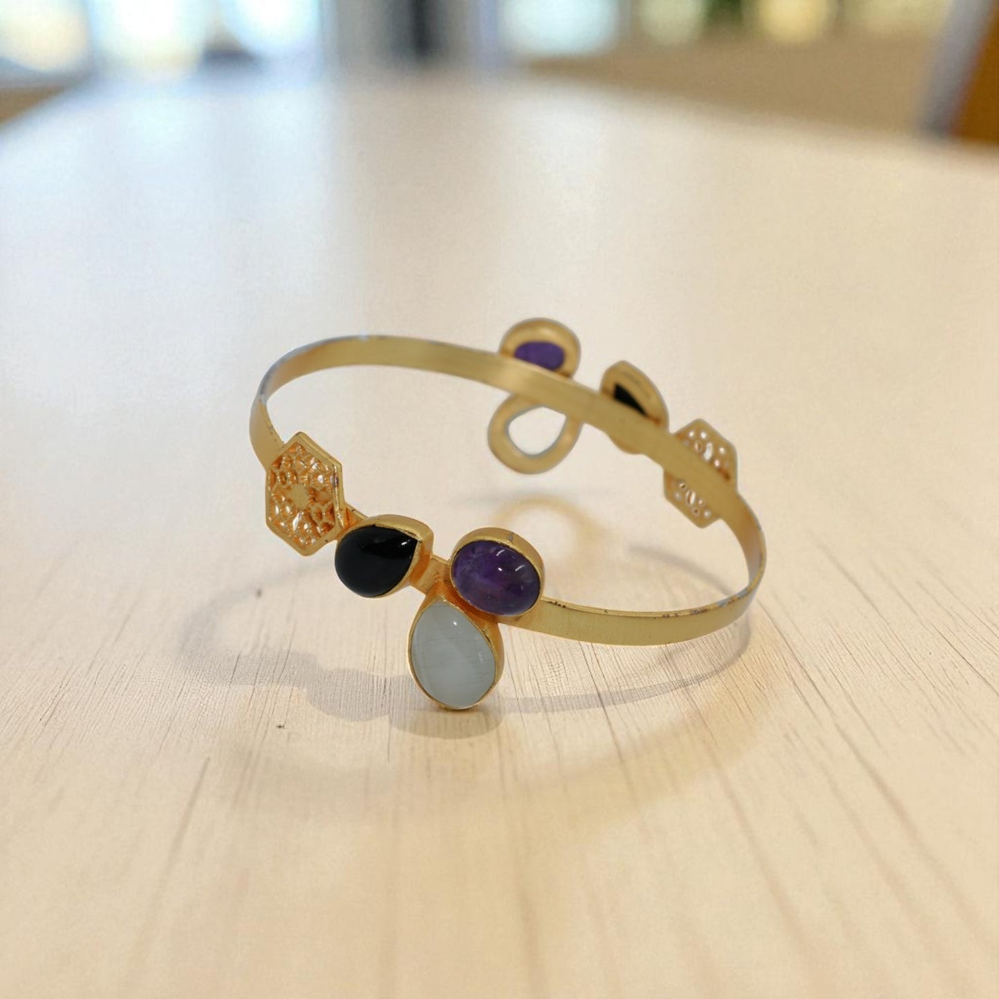 Elegant Gold-Plated Bangle with Multicolor Gemstone Accents