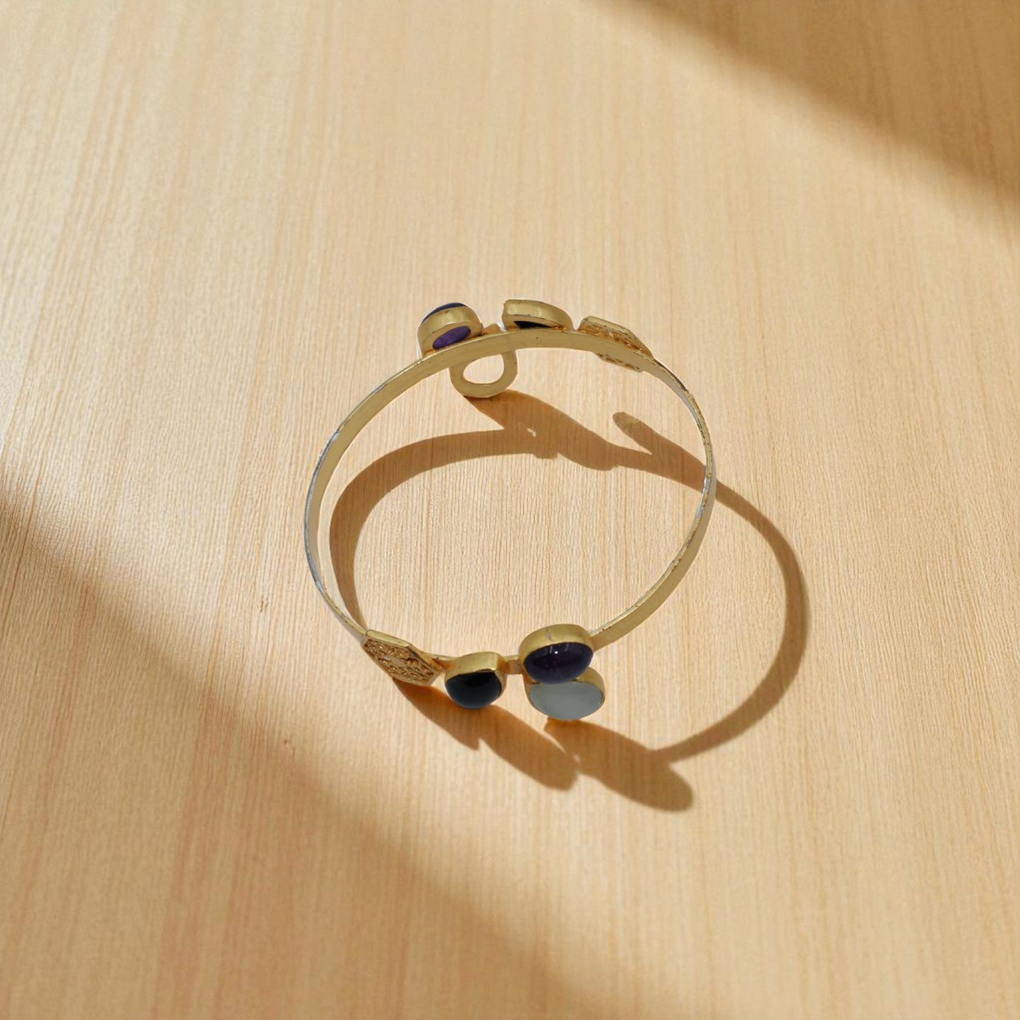 Elegant Gold-Plated Bangle with Multicolor Gemstone Accents