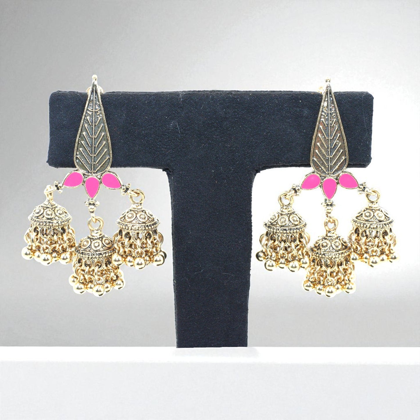 Triple Jhumka Dangler Earrings with Pink Enamel Leaf Design – Antique Gold Finish